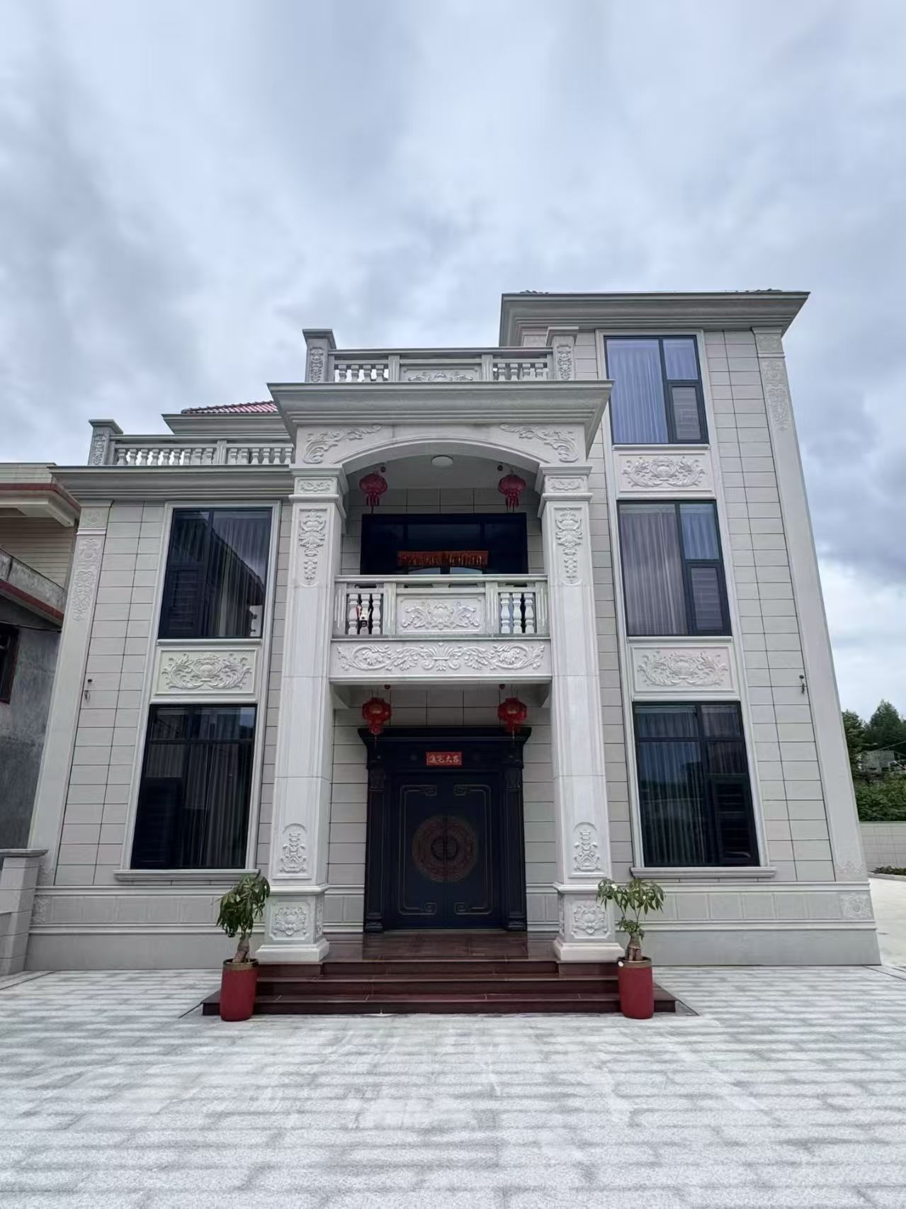 葫芦岛 芝麻白石材别墅干挂案例展示